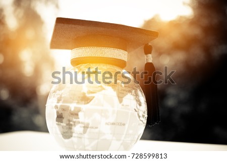 Education in Global, Graduation cap on top model Earth. Concept of abroad international Educational, Back to School and Studies lead to success in world wide.