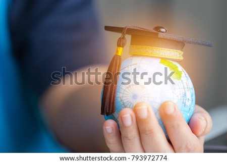Education in Global, Graduation cap on Businessman holding Earth globe model map with Radar background in hands. Concept of global business, abroad educational, Back to School.