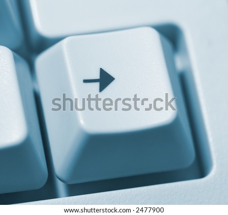 Look here - closeup of right key on keyboard (blue tone)