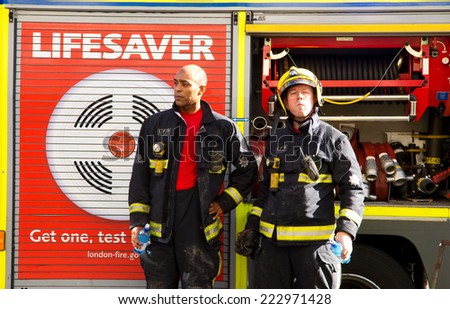 LONDON - OCTOBER 11TH: The fire brigade attend an emergency in waterloo on October 11th, 2014 in London, England, UK. London\'s fire and rescue service is the busiest in the country