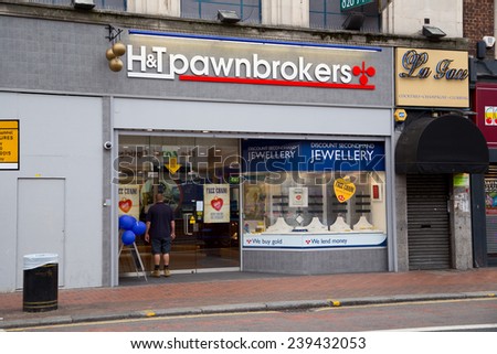 LONDON - SEPTEMBER 5TH: The exterior of a pawnbroker on September the 5th, 2014, in London, England, UK. Pawnbrokers provide an alternative way to borrow cash in exchange for valuables.
