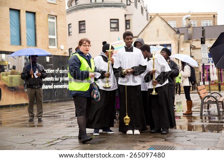 LONDON - MARCH 29TH: Unidentified people at a palm sunday procession on March the 29th, 2015, in London, England, UK. Palm sunday is an annual religious celebration.