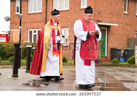 LONDON - MARCH 29TH: The priests at a palm sunday procession on March the 29th, 2015, in London, England, UK. Palm sunday is an annual religious celebration.
