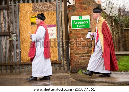 LONDON - MARCH 29TH: the priests at a palm sunday procession on March the 29th, 2015, in London, England, UK. Palm sunday is an annual religious celebration.