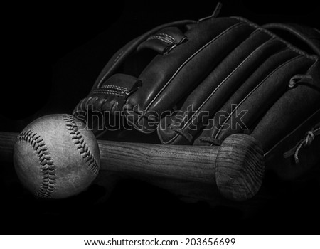black and white grunge effect low key baseball bat, mitt glove and ball with space for text