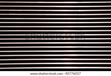 horizontal metal lines on a black background
