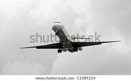 airplane take off with a cloudy sky background