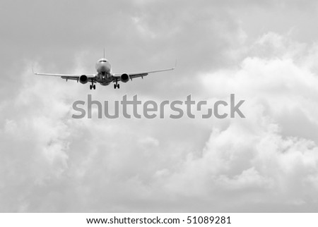 airplane take off with a cloudy sky background