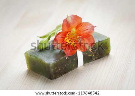 Soap bar with natural ingredients and flower