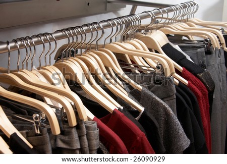 Women clothes on wooden hangers