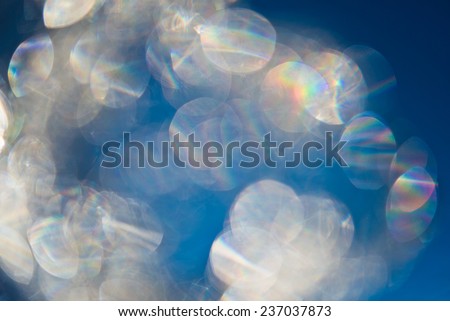 Iridescent sparkling patches of light an elegant background.