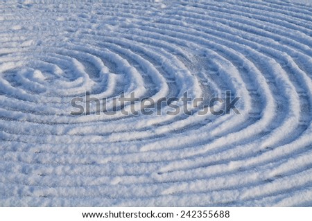 Spiral drawing on snow.