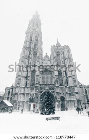 Antwerp The Cathedral of Our Lady at Winter Snowstorm. Vertical toned image