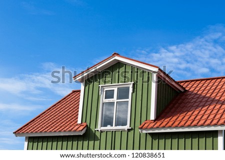 Residential Roof Top under the Bright Blue Sky