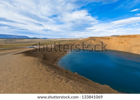 Crater of an extinct volcano Krafla filled with water. Located in Iceland. Horizontal landscape