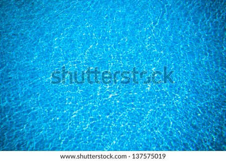 Clear Transparent Pool Water Background. Sun Reflections In Pool Water From Above