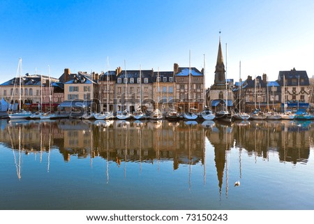 Honfleur harbour in Normandy, France. Old houses and their reflection in water. another Honfleur shots available
