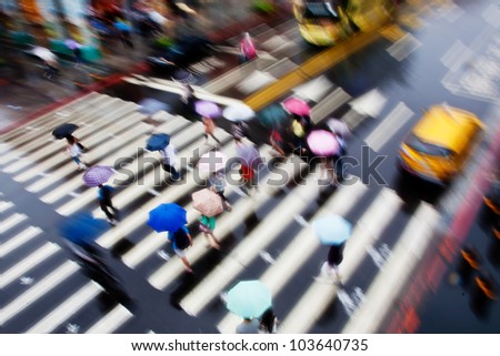 people walk fast in the rain