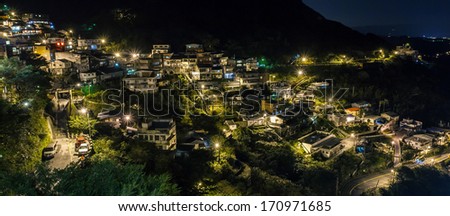 Village On The Hill At Night