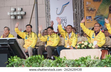 TAIPEI, TAIWAN, MARCH 22 2015, Tour de Taiwan, the International Cycling Road Race. first stage is Taipei city. the mayor is waving his hand.