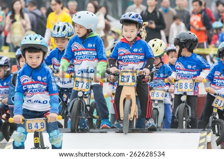 TAIPEI, TAIWAN, MARCH 22 2015, Tour de Taiwan, the International Cycling Road Race. first stage is Taipei city. Also held the Kid\'s Push Bike road race.