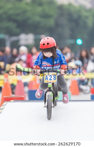 TAIPEI, TAIWAN, MARCH 22 2015, Tour de Taiwan, the International Cycling Road Race. first stage is Taipei city. Also held the Kid's Push Bike road race.