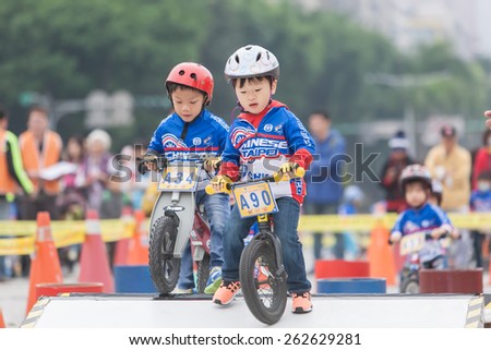 TAIPEI, TAIWAN, MARCH 22 2015, Tour de Taiwan, the International Cycling Road Race. first stage is Taipei city. Also held the Kid's Push Bike road race.