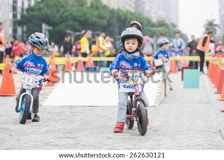TAIPEI, TAIWAN, MARCH 22 2015, Tour de Taiwan, the International Cycling Road Race. first stage is Taipei city. Also held the Kid\'s Push Bike road race.