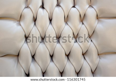 Luxury white fabric texture on an old sofa