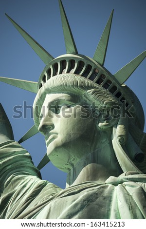 Statue of Liberty on Hudson River in NYC