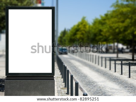 Empty billboard for your ad near a road