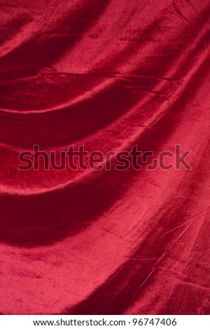 Texture of a red detailed piece of satin