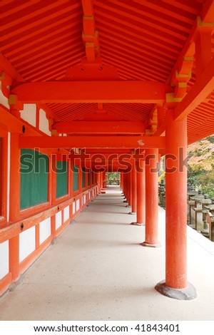 a japanese red corridor in kasuga taisha shrine