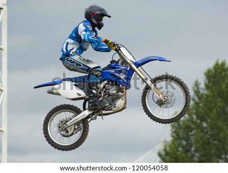 MOSCOW - JUNE 24: P.Silaev on a clubs tournament of motocross competition of Red Racing Group club on June 24, 2012 in Moscow, Krilatskoe, Russia