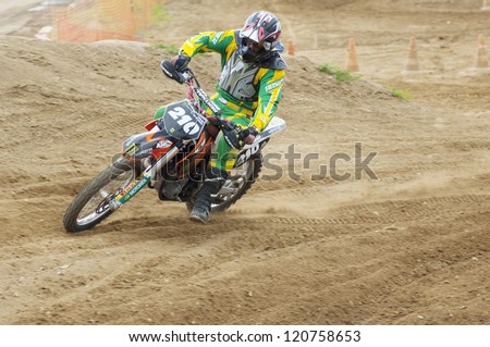 MOSCOW - JUNE 24: K.Al-Shaer ride on a motocross competition of Red Racing Group club on June 24, 2012 in Moscow, Krilatskoe, Russia