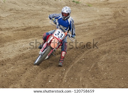 MOSCOW - JUNE 24: V.Korchnoy ride on a clubs tournament of motocross competition of Red Racing Group club on June 24, 2012 in Moscow, Krilatskoe, Russia