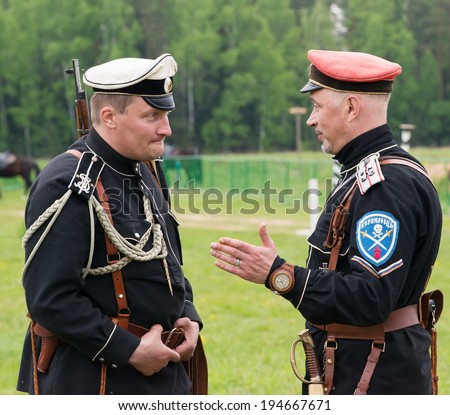 RUSSIA, CHERNOGOLOVKA - MAY 17: Two unidentified officers talks on History reenactment of battle of Civil War in 1914-1919 on May 17, 2014, Chernogolovka city, Ivanovskoe village, Russia