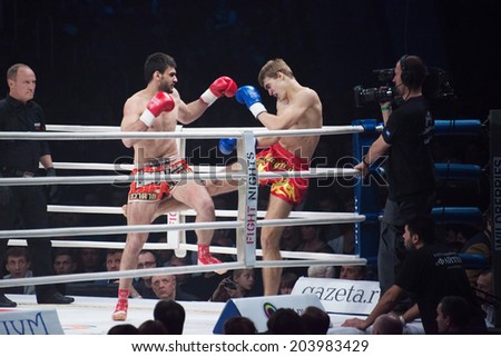 MOSCOW - MARCH 20: Alexander Mischenko (red) vs Timur Aylyarov (blue) on fights tournament FIGHT-15: Revenge on March 20, 2014 in Luzhniki stadium, arena Russia, in Moscow, Russia