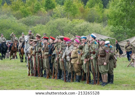 RUSSIA, CHERNOGOLOVKA - MAY 17: Unidentified soldiers in row on History reenactment of battle of Civil War in 1914-1919 on May 17, 2014, Russia