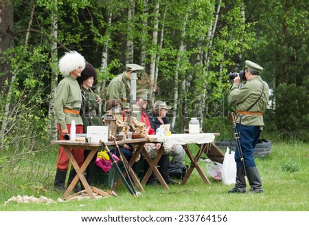 RUSSIA, CHERNOGOLOVKA - MAY 17: Kornilovs hiking squad passing by on History reenactment of battle of Civil War in 1914-1919 on May 17, 2014, Russia