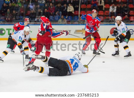 MOSCOW - DECEMBER 3: Shefer A (18) fall down on game CSKA vs Severstal on Russian KHL premier hockey league Championship on December 3, 2014, in Moscow, Russia. CSKA won 9:1