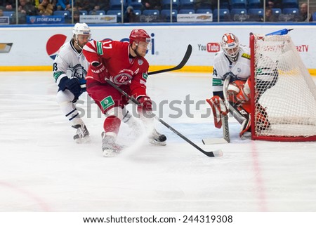 MOSCOW - JANUARY 10: V. Soloduhin (17) in action on hockey game Vityaz vs Medvezchak on Russian KHL premier hockey league Championship on January 10, 2015, in Moscow, Russia. Medvezcak won 3:2