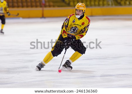 MOSCOW - DECEMBER 12, 2014: Antipov A. (24) in action during the Russian  bandy league game Dynamo Moscow vs SKA Neftyanik in sport palace Krilatskoe, Moscow, Russia. Dynamo won 9:1