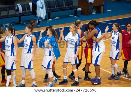 MOSCOW - DECEMBER 4, 2014: Unidentified players shakes hands just after International Europe bascketball league match Dynamo Moscow vs Maccabi Ashdod Israel in sport palace Krilatskoe, Moscow, Russia