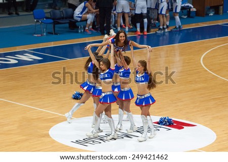MOSCOW - DECEMBER 4, 2014: Unidentified cheerleaders in pyramid during the International Europe bascketball league match Dynamo Moscow vs Maccabi Ashdod in sport palace Krilatskoe, Moscow, Russia
