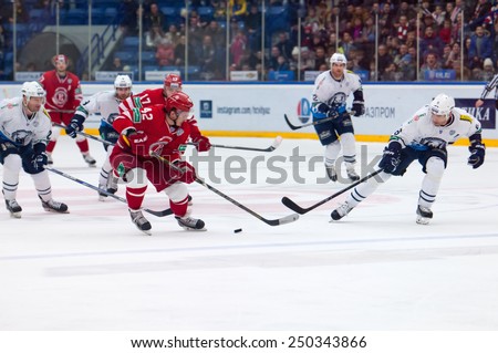 MOSCOW - JANUARY 10: Anton Korolyov (42) attack on hockey game Vityaz vs Medvezchak on Russian KHL premier hockey league Championship on January 10, 2015, in Moscow, Russia. Medvezcak won 3:2