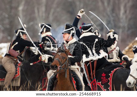 RUSSIA, APRELEVKA - FEBRUARY 7: Unidentified cavalry fight by swords on reenactment of the Napoleonic maneuvers near the Aprelevka city, in 1812. Moscow region, Aprelevka, 7 February, 2015, Russia