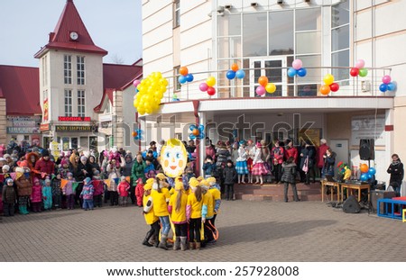MOSCOW, RUSSIA - FEBRUARY 22: Unidentified kid dance on a square on Russian religious and folk holiday Maslenitsa near Culture center Peresvet on February 22, 2015, Russia