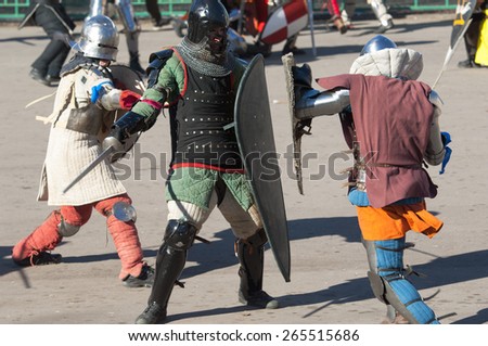 RUSSIA, MOSCOW - MARCH 14: Unidentified people in retro costume fights on history reenactment of the Medieval maneuvers in Moscow, 14 March, 2015, Russia