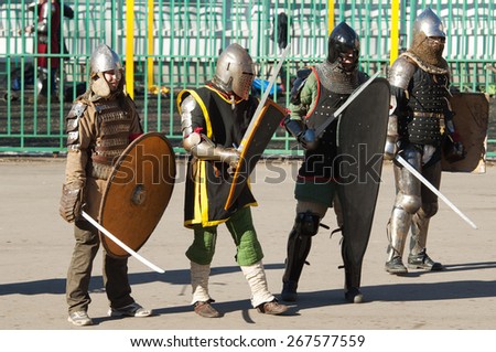 RUSSIA, MOSCOW - MARCH 14: Unidentified people in retro costume on history reenactment of the Medieval maneuvers in Moscow, 14 March, 2015, Russia